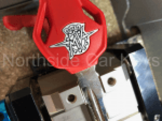 Original key in key machine for decoding for Replacement key made for this 2015 MV AGUSTA TURISMO VELOCE MOTORCYCLE