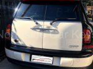 2010 MINI COOPER WAGON rear view