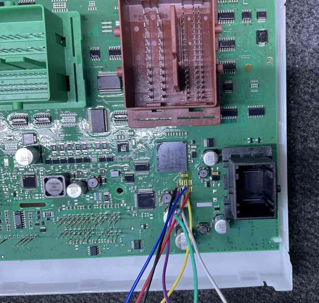 Volvo SX40 ECU with wiring soldered to key programmer