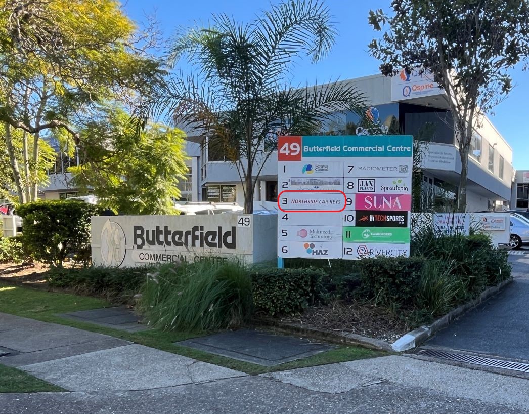 Front entrance sign at Butterfield Commercial Centre showing unit 3 as Northside Car Keys