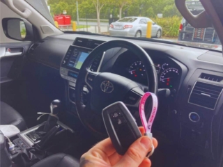 2021 Toyota Prado view of dashboard with aftermarket smart key by Northside Car Keys